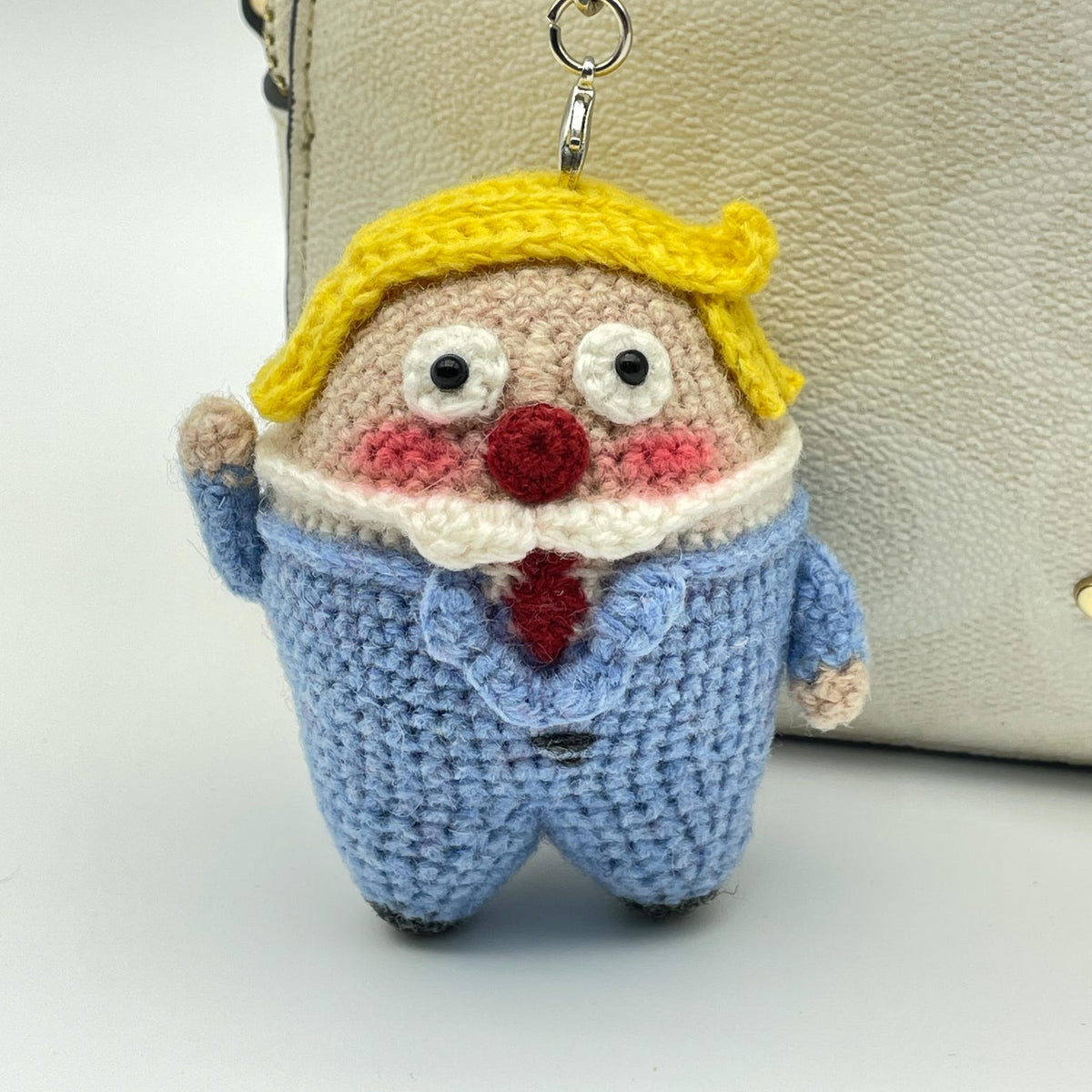 Artisan micro‑crochet Trump statuettes, hanging adornments, purse dangling trinkets, collector display sculptures, Yuletide household decor