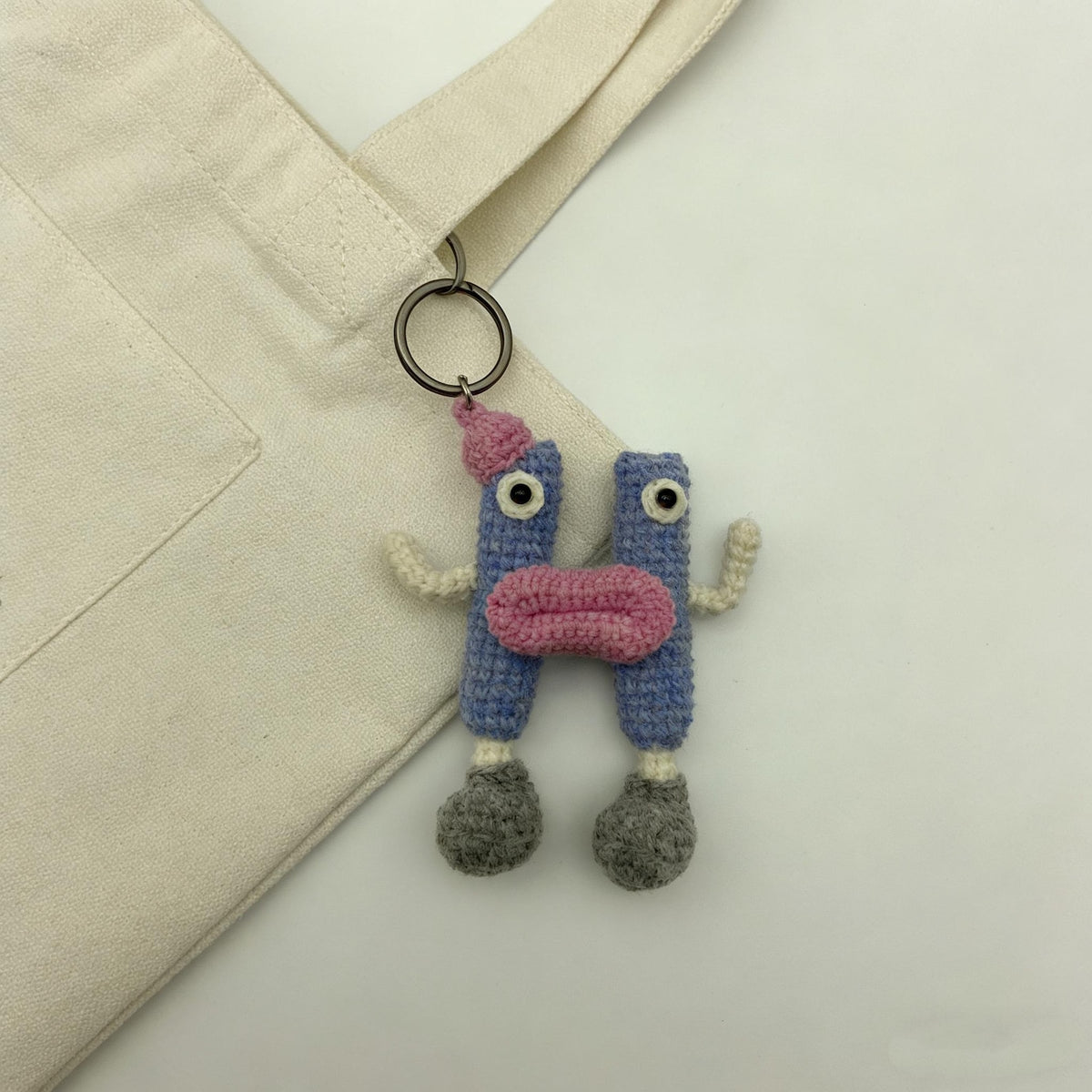 Artisan woven uppercase H charm, sack dangling trinket, paired monogram memento, birthday milestone treasure, Yuletide tote embellishment