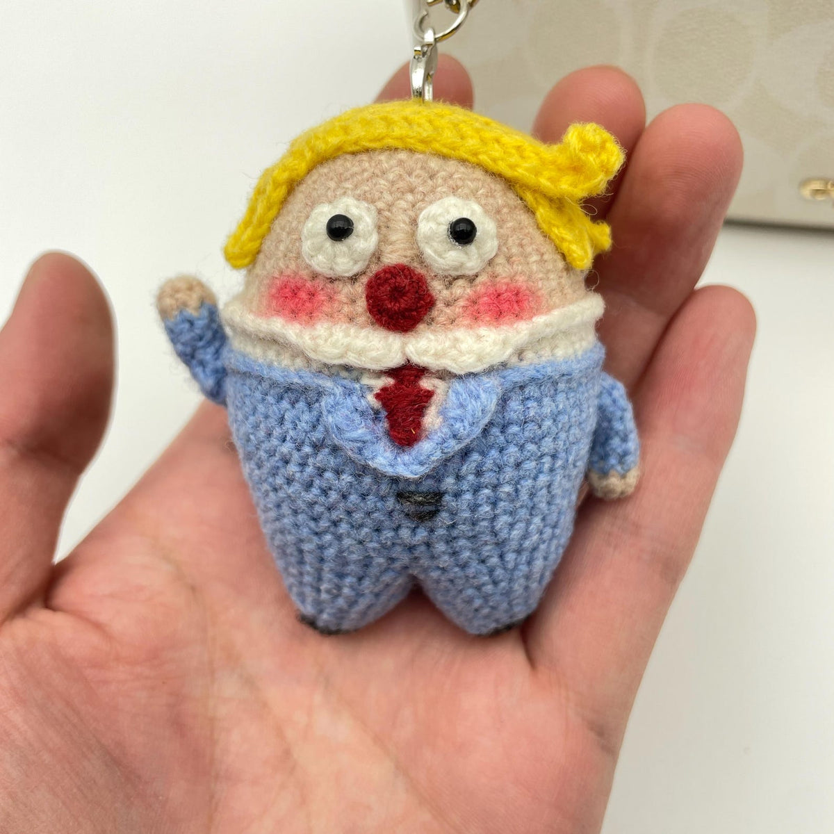 Artisan micro‑crochet Trump statuettes, hanging adornments, purse dangling trinkets, collector display sculptures, Yuletide household decor