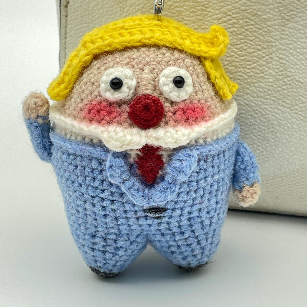 Artisan micro‑crochet Trump statuettes, hanging adornments, purse dangling trinkets, collector display sculptures, Yuletide household decor