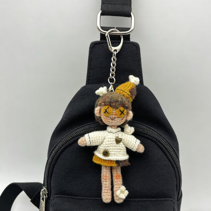 Artisan micro‑crochet maiden figurine, imaginative table‑top ornamental piece, hobbyist showcase sculpture, Yuletide home adornment