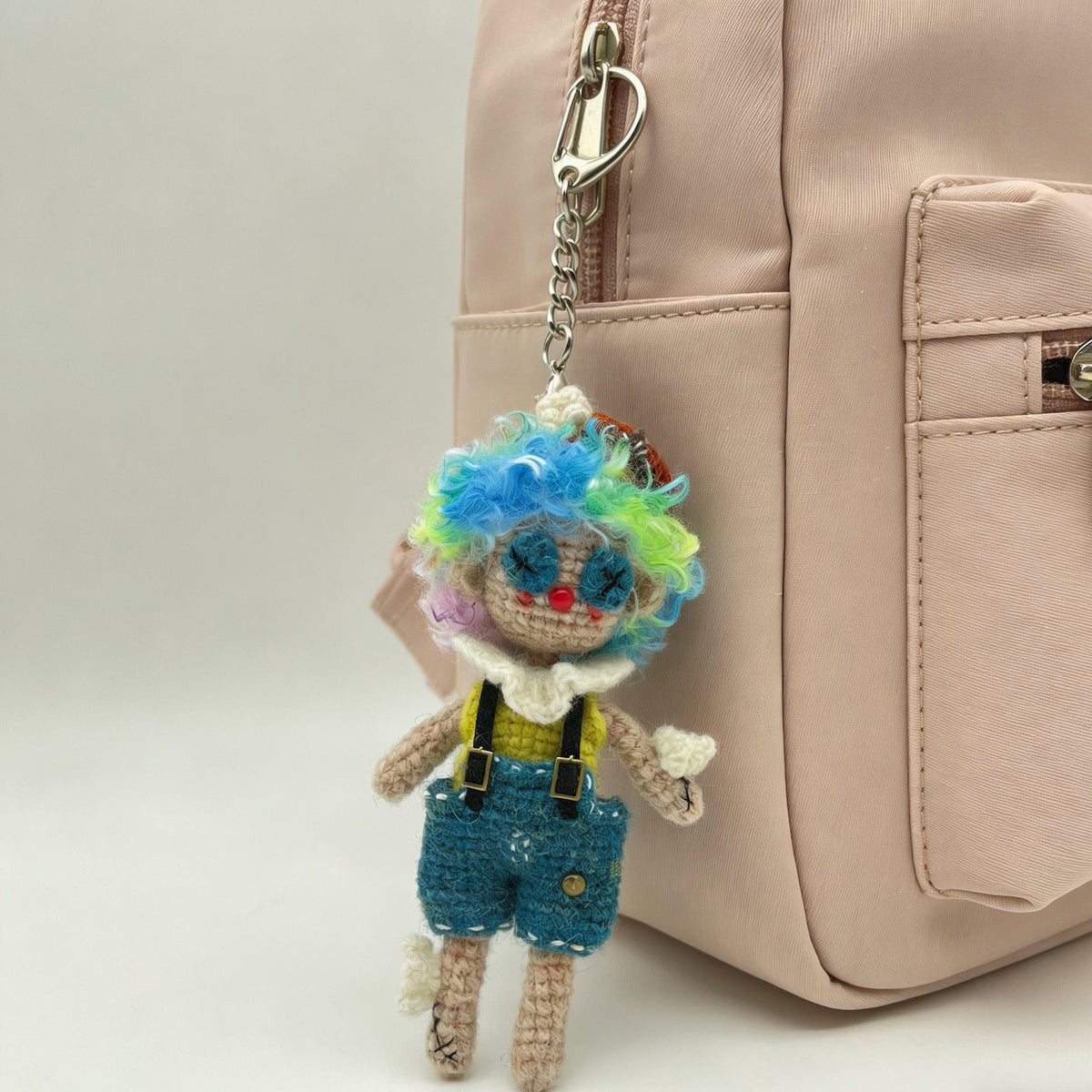Artisan clown figurines, rucksack dangling trinkets, table‑top showcase ornaments, hobbyist display sculptures, Yuletide household adornment