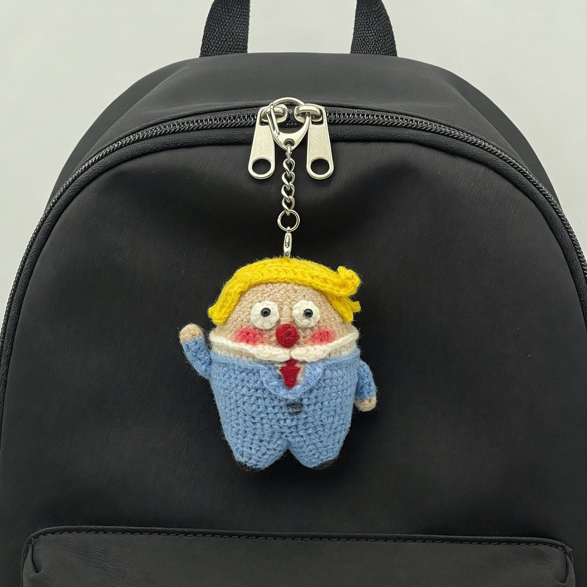 Artisan micro‑crochet Trump statuettes, hanging adornments, purse dangling trinkets, collector display sculptures, Yuletide household decor