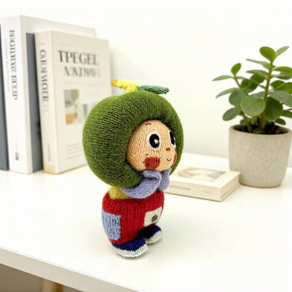 Artisan knit green apple figurine, nursery ornamental piece, birthday milestone memento, hobbyist showcase treasure, Yuletide home adornment