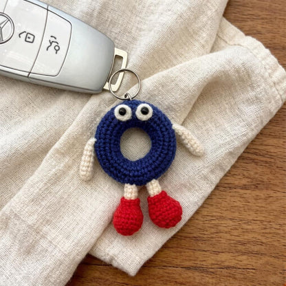 Artisan woven capital O charm, key suspend trinket, rucksack ornamental accents, personalized initial adornment, Yuletide pack embellishment