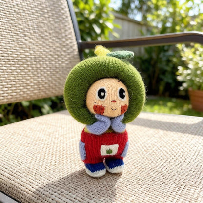 Artisan knit green apple figurine, nursery ornamental piece, birthday milestone memento, hobbyist showcase treasure, Yuletide home adornment