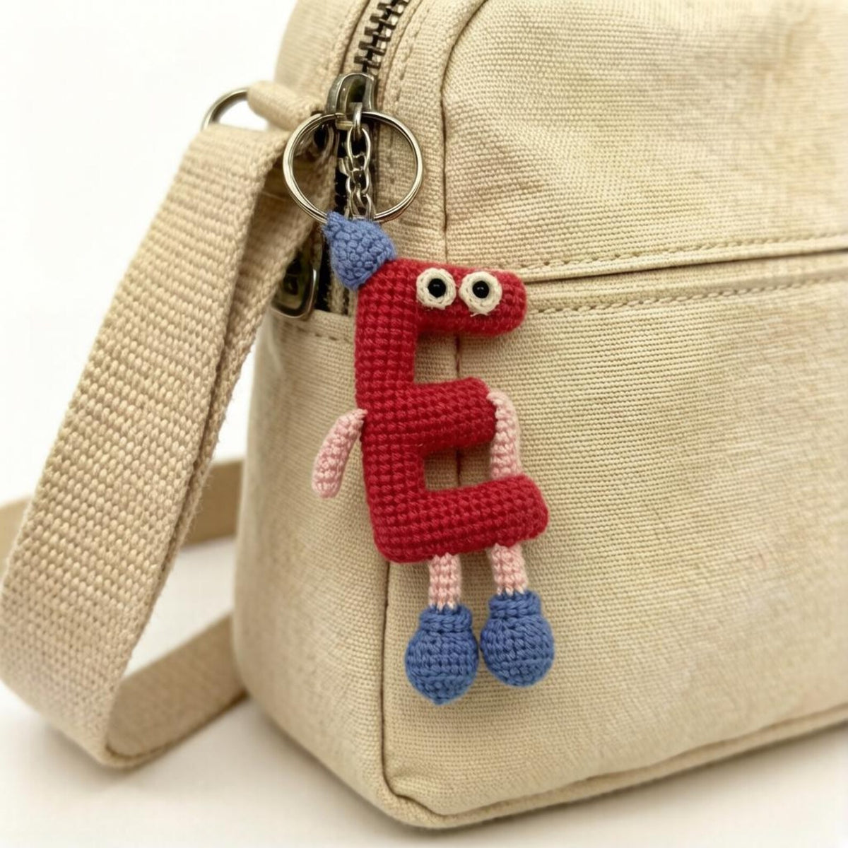 Artisan woven uppercase E charm, rucksack ornamental trim, imaginative birthday memento, paired romantic keepsake, Yuletide pack adornment