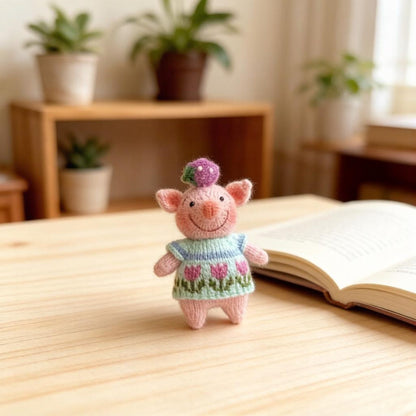 Artisan knit piglet sculpted pieces, yarn crafted statuettes, one-of-a-kind hobbyist souvenirs, household adornments, Yuletide indoor trims