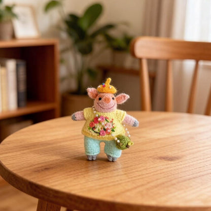 Artisan knit piglet sculpted piece, tabletop adornments, pocket carry figurines, hobbyist display statuettes, Yuletide table accents