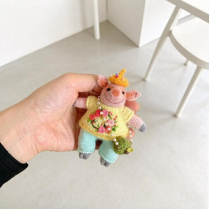 Artisan knit piglet sculpted piece, tabletop adornments, pocket carry figurines, hobbyist display statuettes, Yuletide table accents