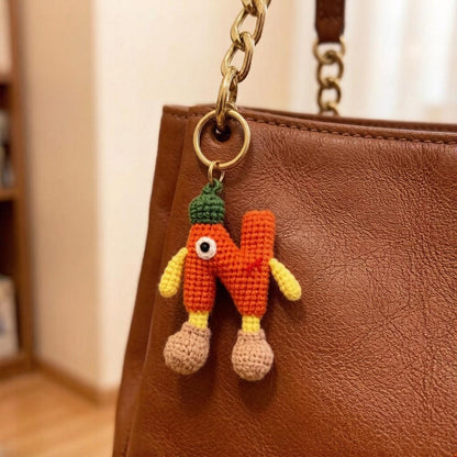 Artisan wool knit letter N charm figurine, keyring trinket, sack adornment, paired monogram key dangling piece, Yuletide tote embellishment