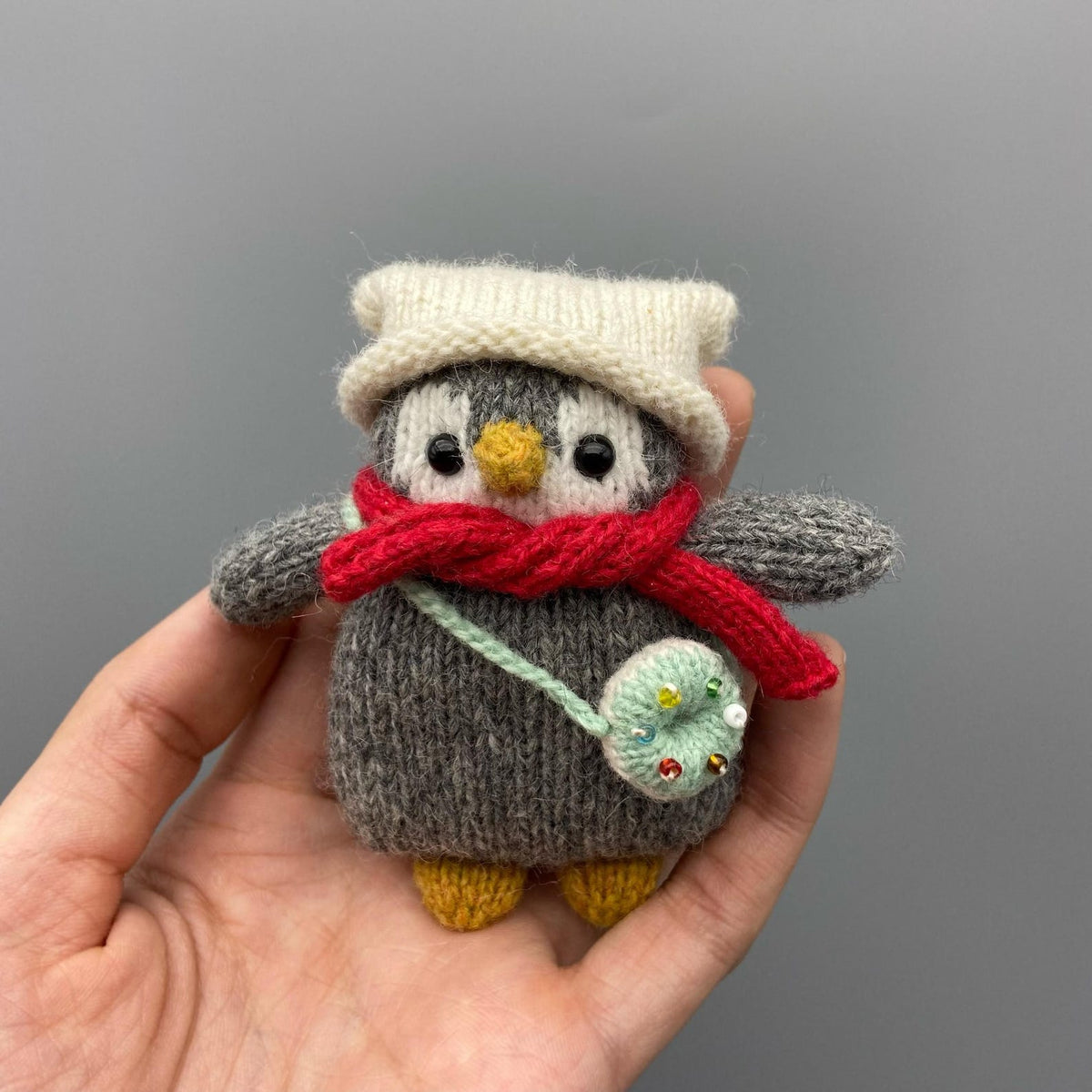 Artisan penguin figurines, imaginative souvenir pieces, purse dangling adornments, juvenile celebratory memento, Yuletide seasonal ornament