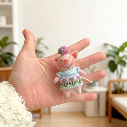 Artisan knit piglet sculpted pieces, yarn crafted statuettes, one-of-a-kind hobbyist souvenirs, household adornments, Yuletide indoor trims