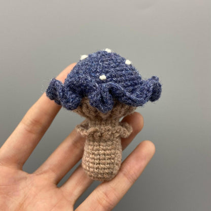 Artisan knit fungus sculptures, imaginative seasonal favors, purse adornments, keyring trinkets, display tokens, Yuletide interior decor