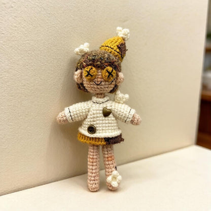 Artisan micro‑crochet maiden figurine, imaginative table‑top ornamental piece, hobbyist showcase sculpture, Yuletide home adornment