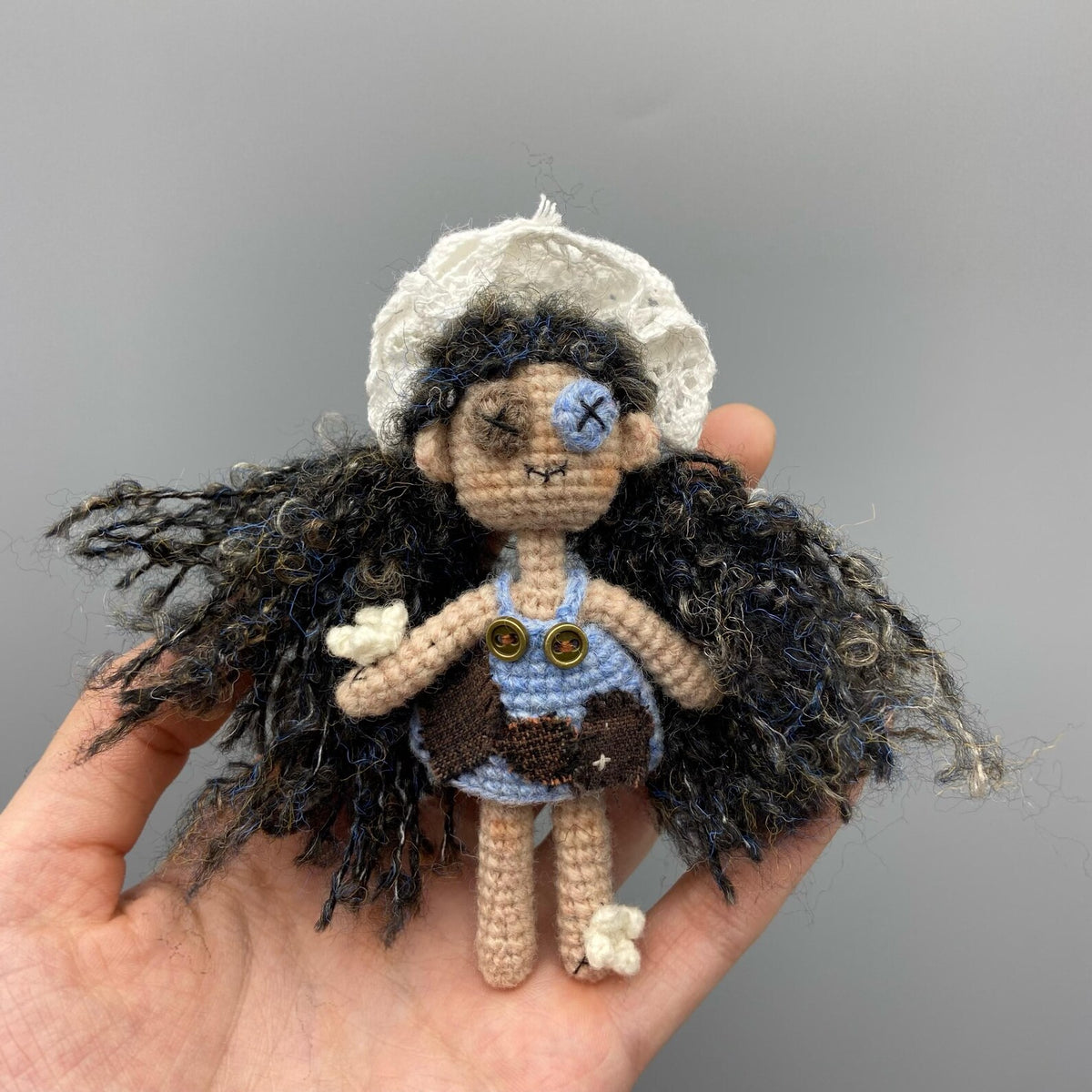 Artisan knit maiden figurines, imaginative ornamental pieces, purse‑hung trinkets, hobbyist‑oriented mementos, Yuletide wearable adornment
