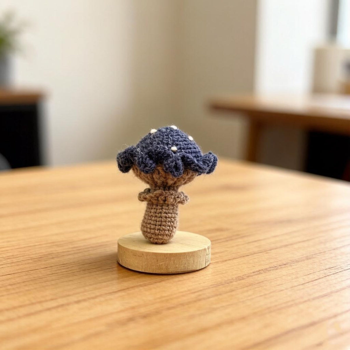 Artisan knit fungus sculptures, imaginative seasonal favors, purse adornments, keyring trinkets, display tokens, Yuletide interior decor