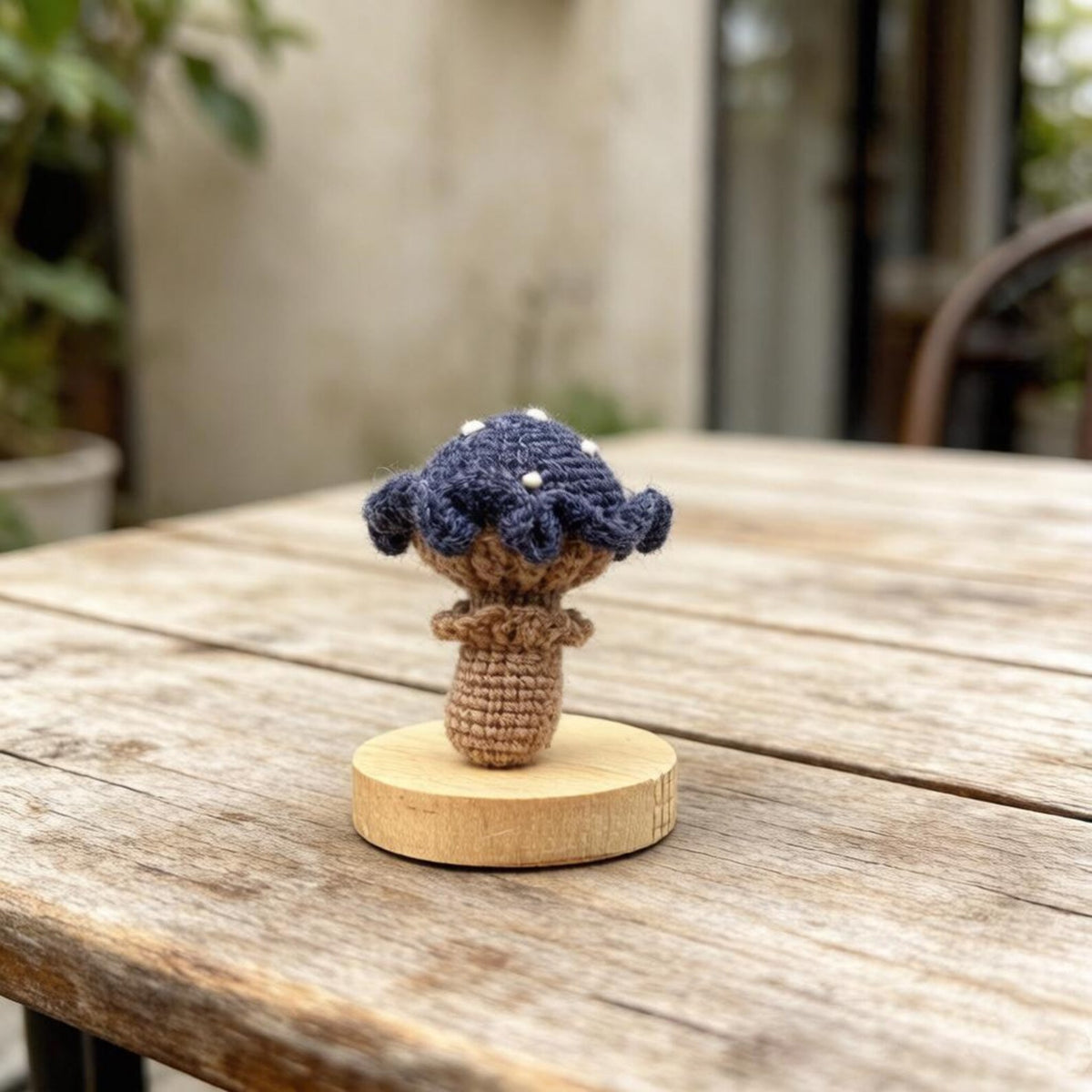 Artisan knit fungus sculptures, imaginative seasonal favors, purse adornments, keyring trinkets, display tokens, Yuletide interior decor