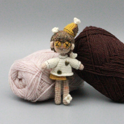 Artisan micro‑crochet maiden figurine, imaginative table‑top ornamental piece, hobbyist showcase sculpture, Yuletide home adornment