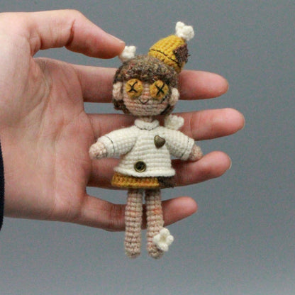 Artisan micro‑crochet maiden figurine, imaginative table‑top ornamental piece, hobbyist showcase sculpture, Yuletide home adornment