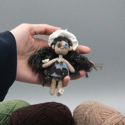 Artisan knit maiden figurines, imaginative ornamental pieces, purse‑hung trinkets, hobbyist‑oriented mementos, Yuletide wearable adornment