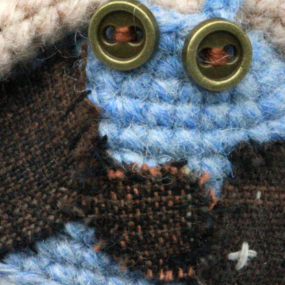 Artisan knit maiden figurines, imaginative ornamental pieces, purse‑hung trinkets, hobbyist‑oriented mementos, Yuletide wearable adornment