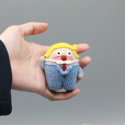 Artisan micro‑crochet Trump statuettes, hanging adornments, purse dangling trinkets, collector display sculptures, Yuletide household decor