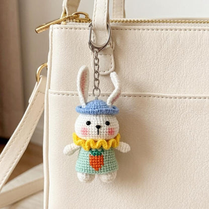 Artisan knit hare sculpted pieces, handcrafted tabletop ornamental trinkets, hobbyist display statues, Yuletide room embellishments