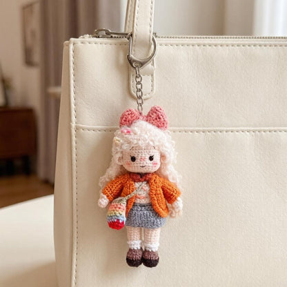 Artisan knit maiden sculpted pieces, travel carry hanging trinkets, infant gathering memorabilia, Yuletide ornamental accents