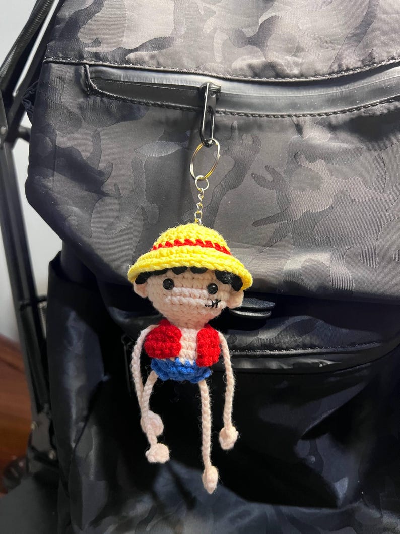 Crochet Straw Hat Pirate Keychain with Stretchy Arms | Handmade Amigurumi Bag Charm, Anime Fan Gift, Pirate Boy