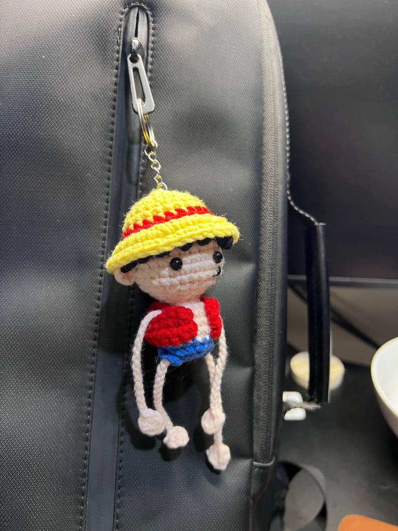 Crochet Straw Hat Pirate Keychain with Stretchy Arms | Handmade Amigurumi Bag Charm, Anime Fan Gift, Pirate Boy